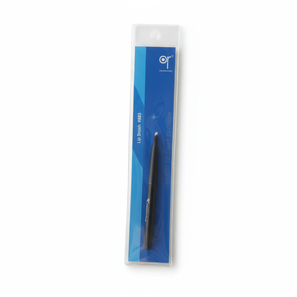 Eyebrow pencil in packaging on a beige background